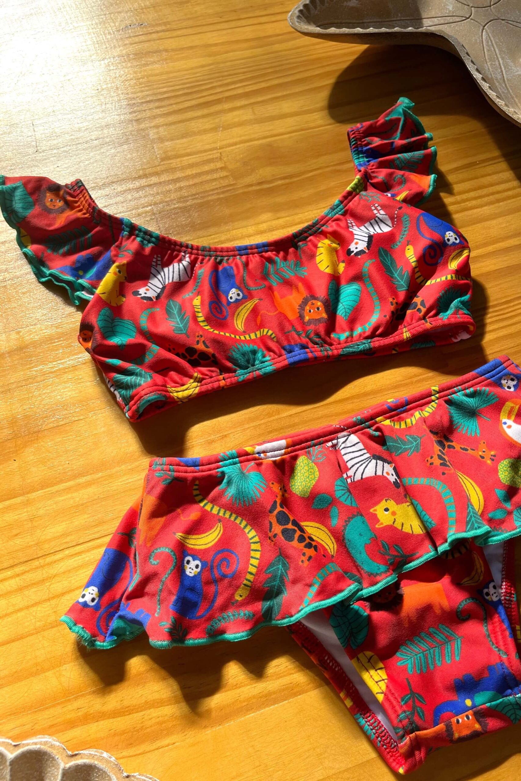 Biquini Conjunto Infantil Ciganinha Safari Tecido: Sensitel Sun Composição: 84% Poliamida e 16% Elastano. Coleção: Verão 2024 Disponível nos tamanhos: PP P M G